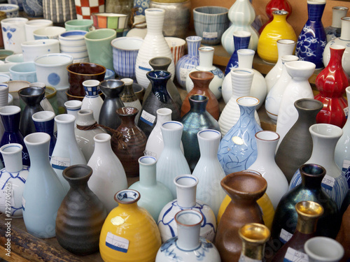 Pile of Various tokkuri Japanese sake decanters for sale in crockery store, Kappabashi Dori, Tokyo photo