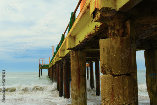 A pier on an Atlantic coast beach, Villa Gesell, Argentina, 02.01.2024 photo