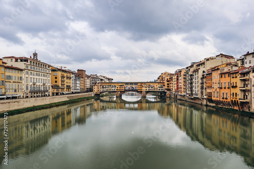 View of the Arno River in Florence and the famous Ponte Vecchio (Old Bridge).