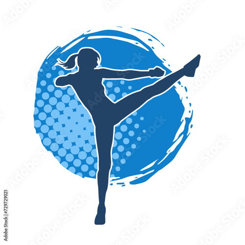 Silhouette of slim female doing exercise. Silhouette of a sporty woman doing gym workout pose. 