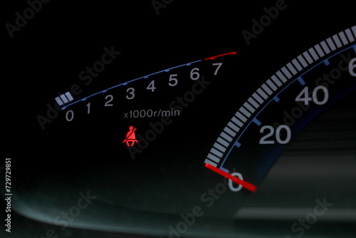 Under exposure photo of car's speedometer. After some edits.