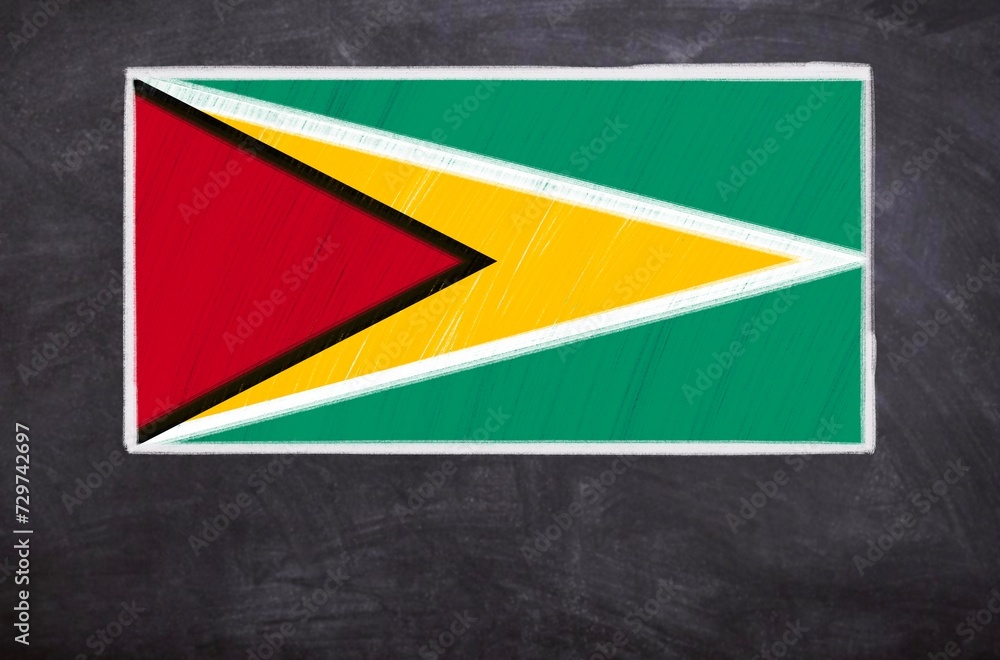 Hand drawn flag of Guyana on a black chalkboard Hand drawn flag of Guyana on a black chalkboard
