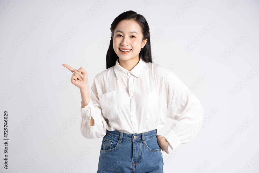 Portrait of young Asian businesswoman posing on white background Portrait of young Asian businesswoman posing on white background