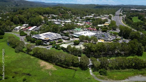 Right to left aerial over Mudgeeraba Market Shopping Centre, Gold Coast, Queensland, Australia photo