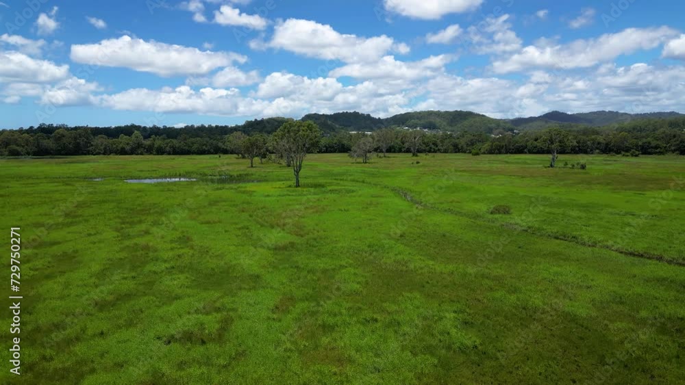 Forward moving aerial over Mudgeeraba Creek and green space, Gold Coast, Queensland, Australia Forward moving aerial over Mudgeeraba Creek and green space, Gold Coast, Queensland, Australia