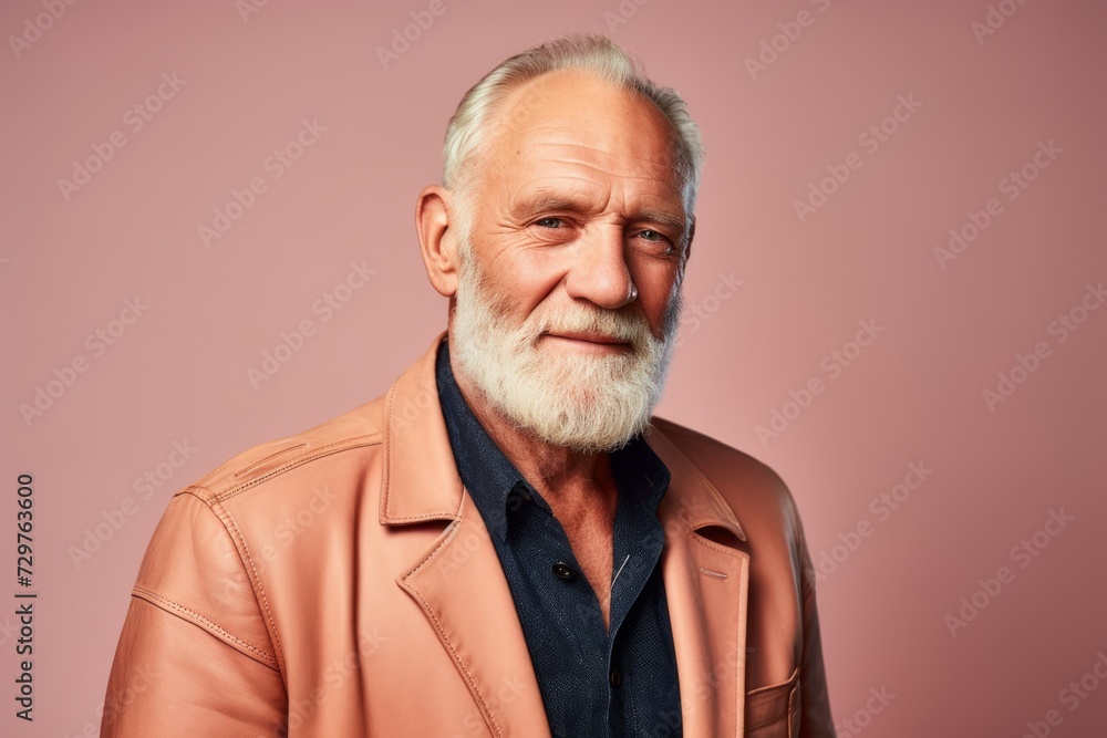 Portrait of a stylish senior man. Studio shot over pink background. Portrait of a stylish senior man. Studio shot over pink background.
