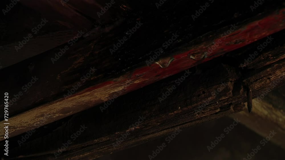 Water Leaking from Ceiling, Rain Drops Falling from the Wooden Ceiling of An Old Cabin. Close Up. Water Leaking from Ceiling, Rain Drops Falling from the Wooden Ceiling of An Old Cabin. Close Up.