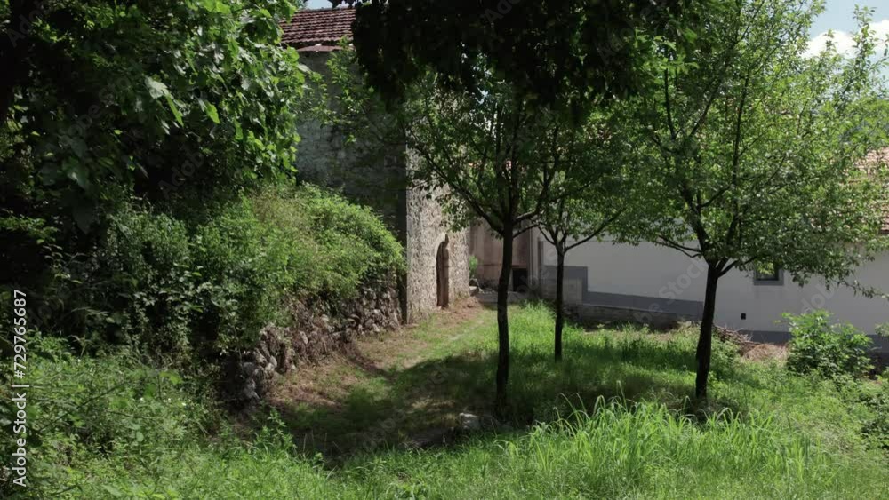 A street of abandoned village with destroyed stone house A street of abandoned village with destroyed stone house