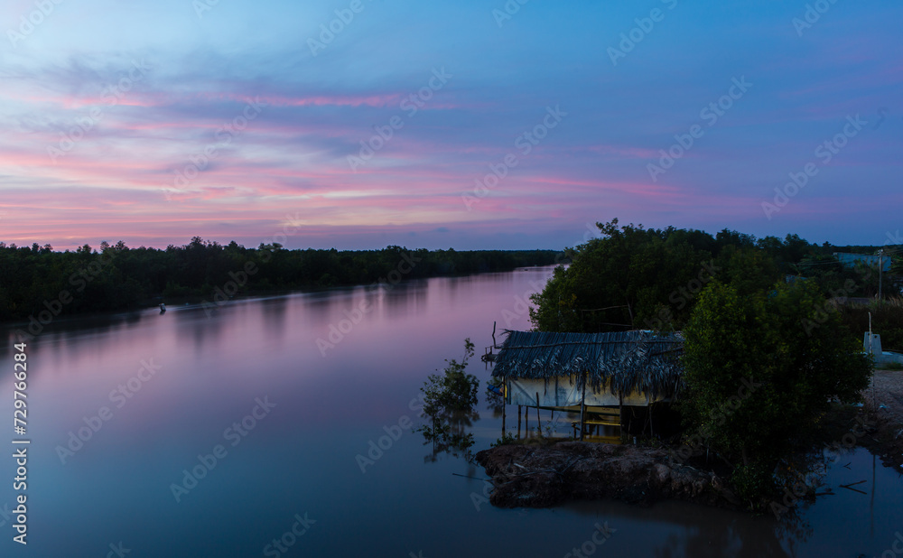 Sunset on Mekong delta river
