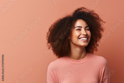Cheerful african american woman with afro hairstyle