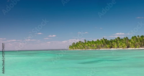 Travelling around wild beaches in Dominican Republic, exotic tropical island beach and Caribbean sea waves on a sunny day photo