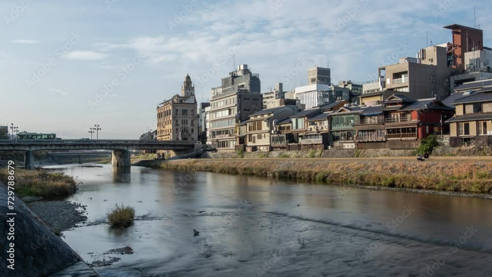 Cityscape skyline time lapse at Kamo river in a morning, Kyoto city, Japan. Cityscape skyline time lapse at Kamo river in a morning, Kyoto city, Japan.