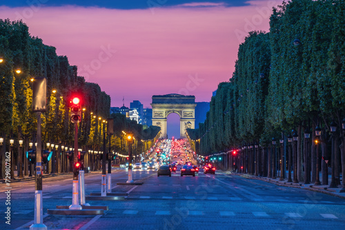 Paris France, city skyline night at Arc de Triomphe and Champs Elysees photo