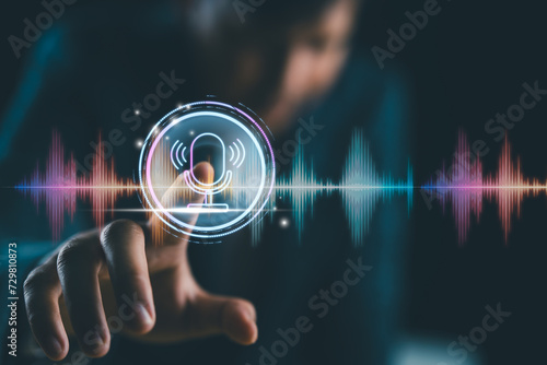 Voice recording. Man touching microphone icon on smartphone. Mobile application record sound, audio, music, voice message or use your voice to direct AI to search for information on Internet.