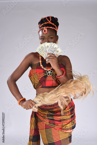 Young black African Nigerian igbo looking gorgeous wearing native attire photo