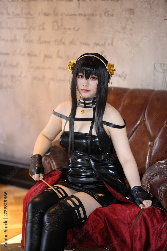 Naklejka premium Portrait of a beautiful young woman Cosplay with Spy dress