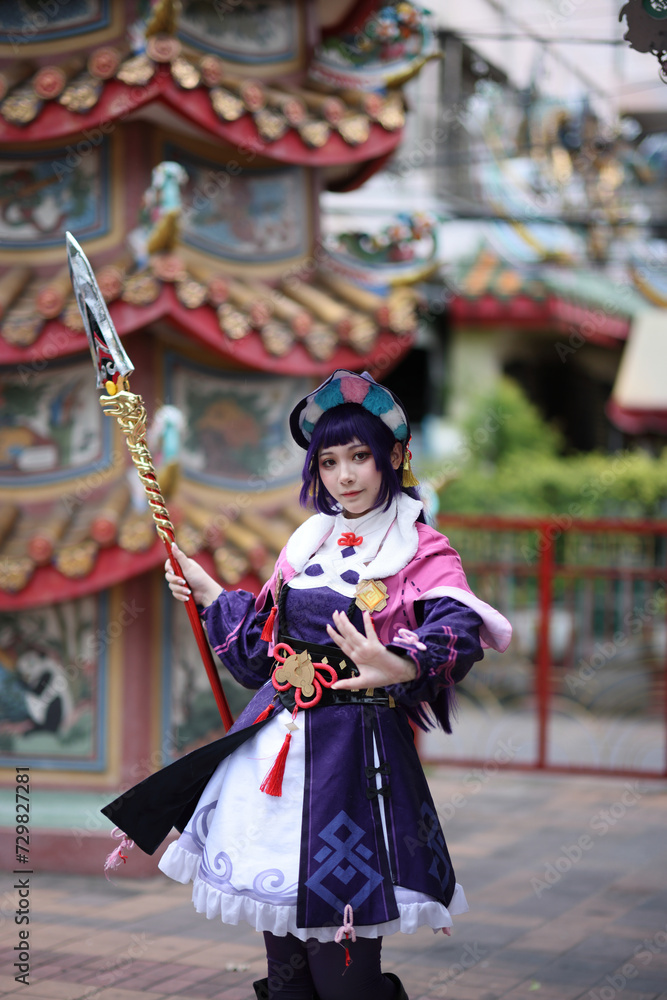 Naklejka premium Portrait of a beautiful young woman game Cosplay with Chinese dress