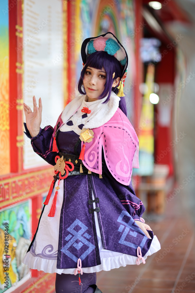 Naklejka premium Portrait of a beautiful young woman game Cosplay with Chinese dress
