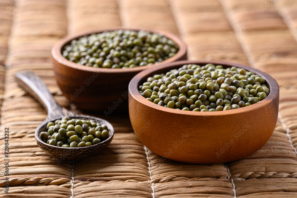 Green mung bean in wooden bowl with spoon, Food ingredients Green mung bean in wooden bowl with spoon, Food ingredients