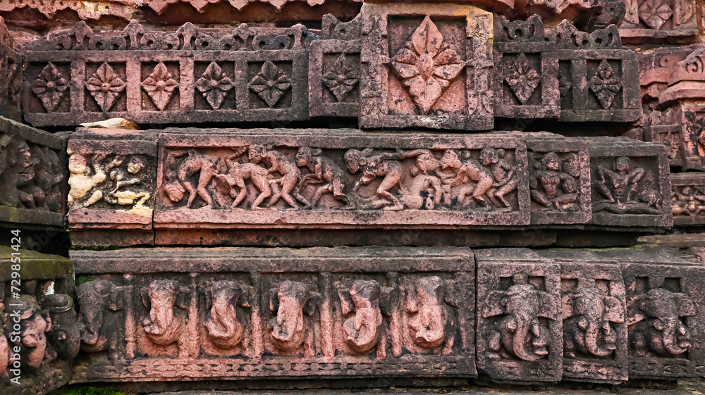 Erotic Carvings, Flower and Elephant Panels on the Char Khamba Jain Temple, Peenjana, Baran, Rajasthan, India.