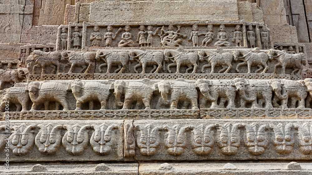 Carving Panels of animals and Hindu deities on the Thakur ji ka Mandir, Todaraisingh, Rajasthan, India.