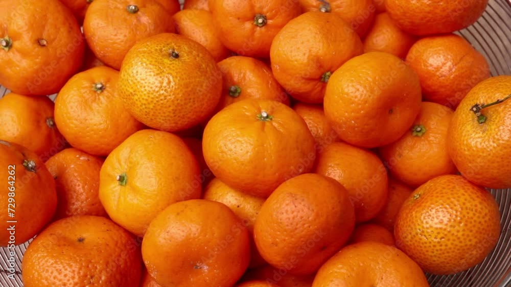 Fresh mandarin oranges fruit or tangerine in bucket Fresh mandarin oranges fruit or tangerine in bucket