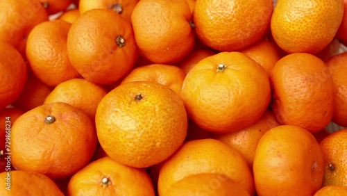Fresh mandarin oranges fruit or tangerine in bucket 