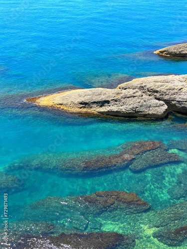 Blue sea and scenic coastal rocks.