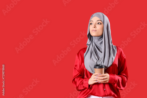 Young Muslim woman in hijab...