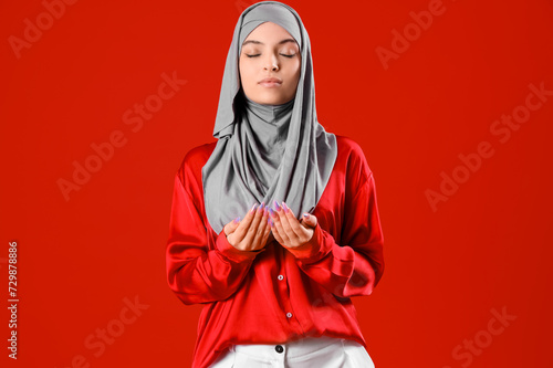 Young Muslim woman in hijab...