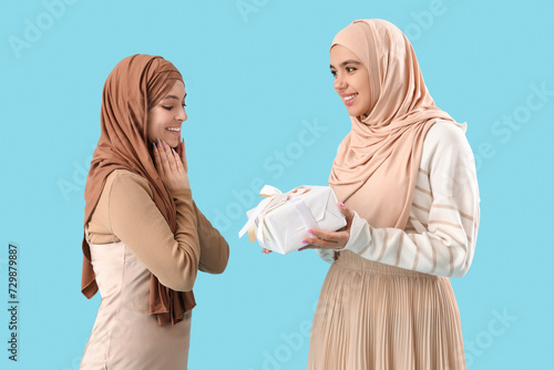 Young Muslim woman in hijab...