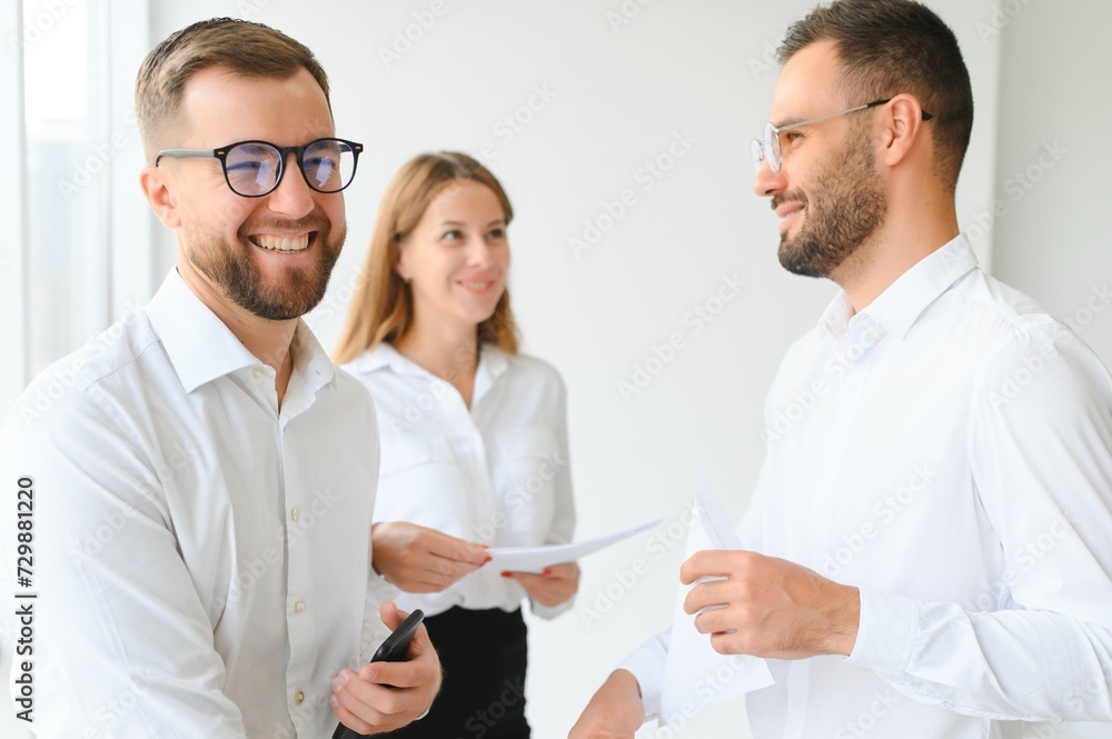 Successful company with happy workers Successful company with happy workers