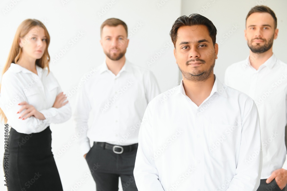 Business people stand on the background of the office corridor Business people stand on the background of the office corridor