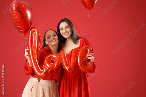 Young lesbian couple with w...