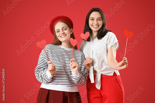 Young lesbian couple with p...