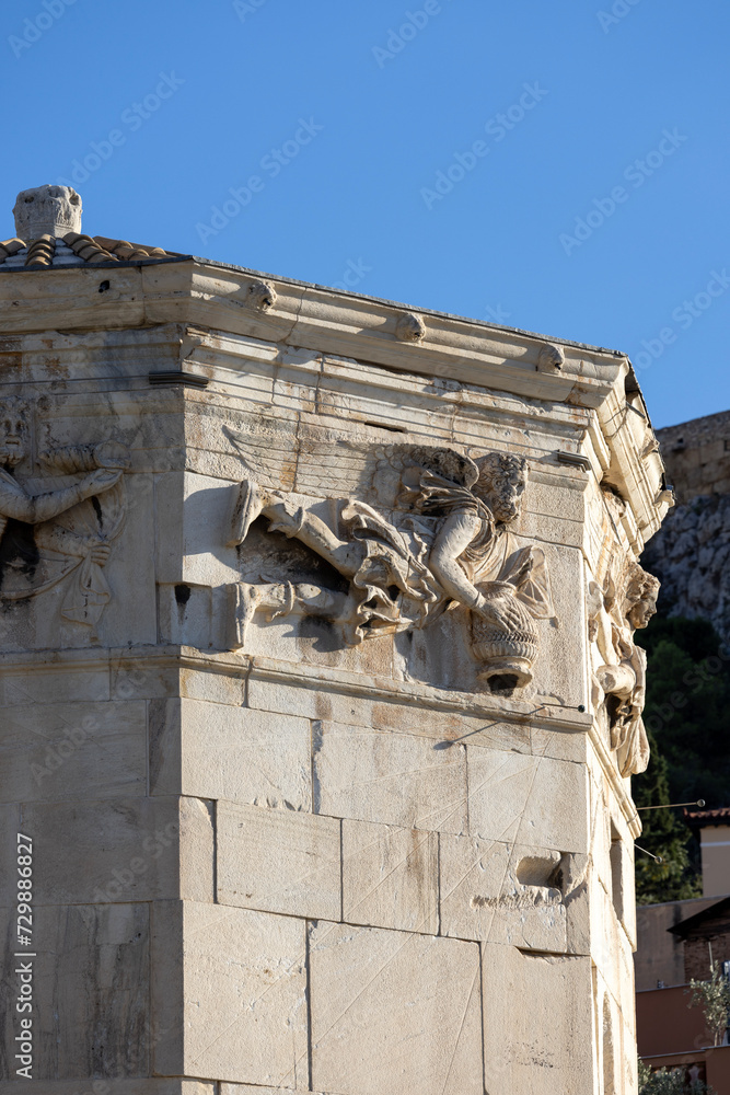 Athens, Greece - October 17, 2022: Tower of the Winds, octagonal marble tower in the Roman Agora