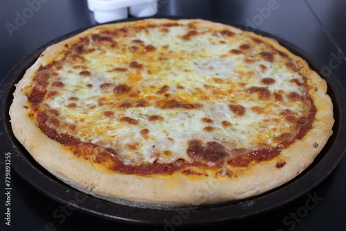 Classic Margherita pizza, a delicious pizza, ready to eat.