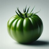green tomato on a white