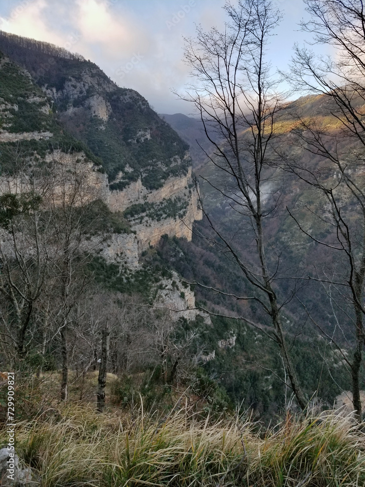 And steep cliff with fog, mountains between Agerola and Amalfi, Italy