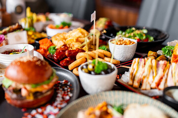 variety of restaurant food dishes on table