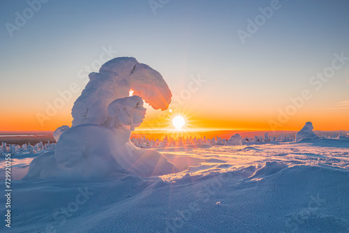 Beautiful winter landscape at sunset. Lapland
