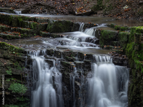 Fototapeta Naklejka Na Ścianę i Meble -  The waterfall in green forest