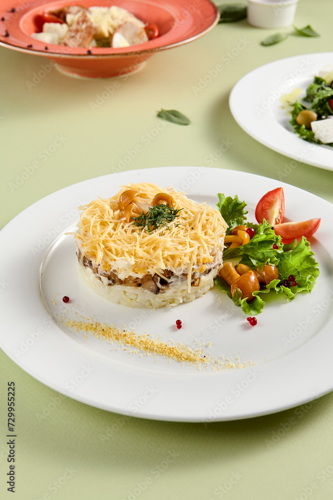 Close-Up of Layered Forest Glade Salad with Cheese, Potatoes, and Mushrooms Close-Up of Layered Forest Glade Salad with Cheese, Potatoes, and Mushrooms