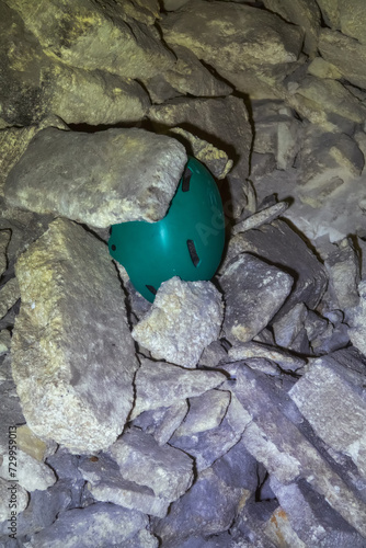 Limestone quarry (stone sawing), which is 200 years old. Underground halls, piles of sawn stones, zigzag corridors, dead ends, niches. Mine collapse and industrial accident photo