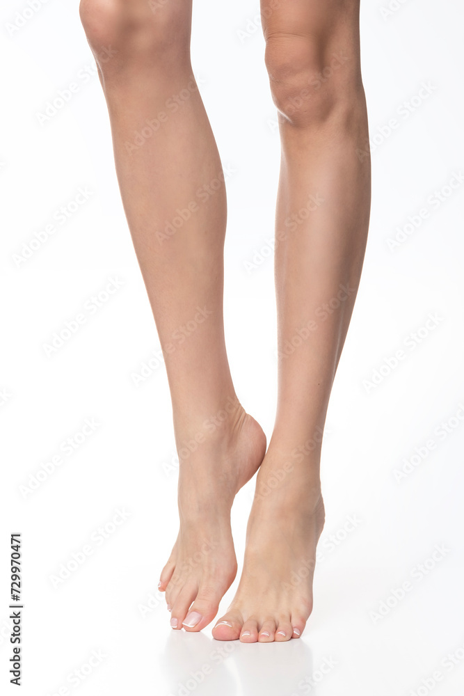 Slim legs on isolated white background. Slim legs on isolated white background.