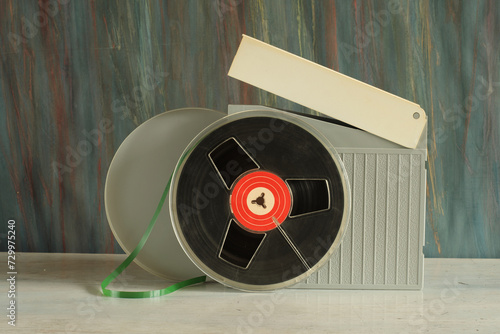Vintage magnetic audio reel to reel tape and storage box, free copy space