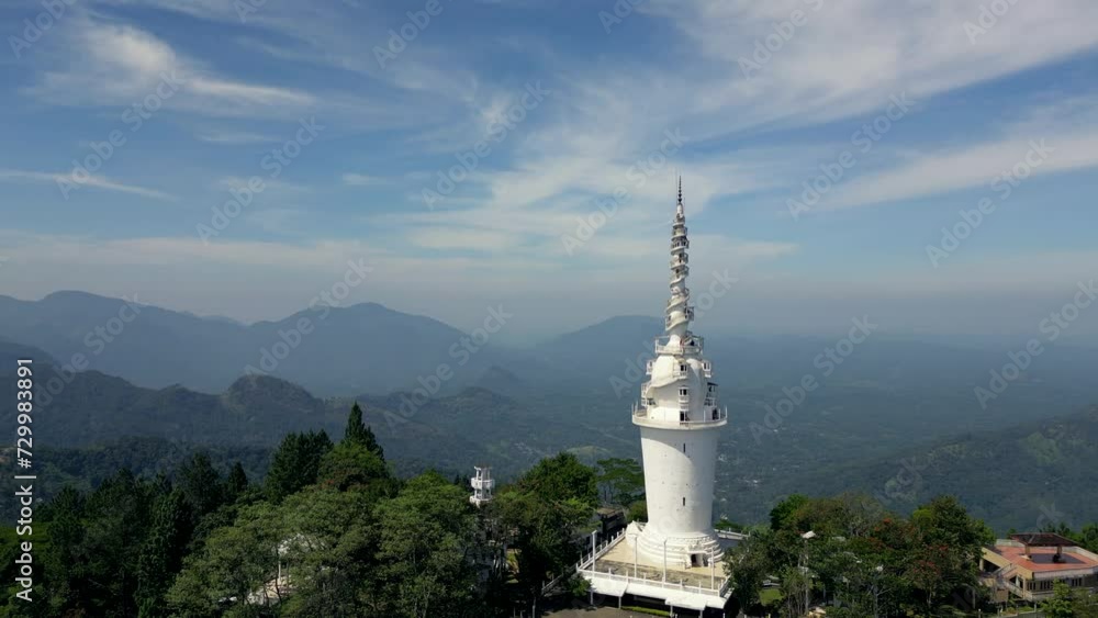 Ambuluwawa Temple in Sri Lanka aerial view. A religious white Tower with stairs to spire Ambuluwawa Temple in Sri Lanka aerial view. A religious white Tower with stairs to spire