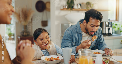 Happy  family and lunch with juice at a table  hungry and a child excited for a drink. Smile  interracial and a mother  father and girl kid eating and enjoying dinner or breakfast together in a home