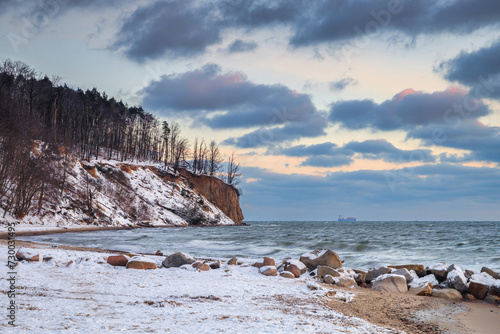 Winter landscape of Baltic Sea coast in Gdynia Orłowo at sunrise, Baltic Sea. Poland