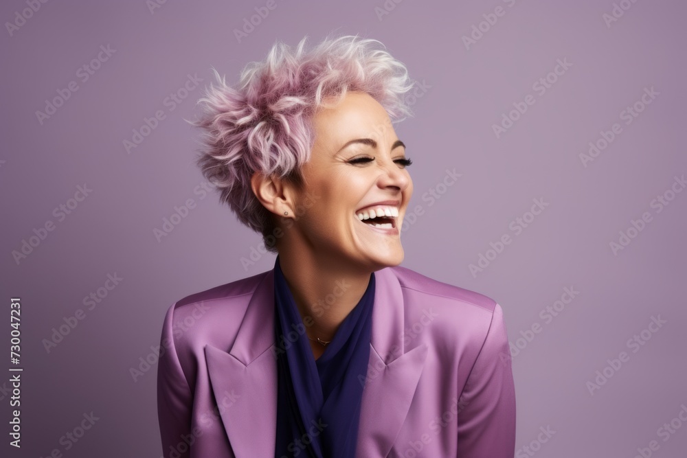 Portrait of smiling middle aged woman with pink hair and violet jacket Portrait of smiling middle aged woman with pink hair and violet jacket